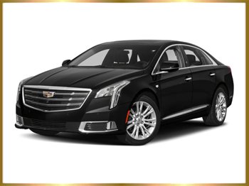 Black Cadillac XTS for Boston Logan Airport transportation